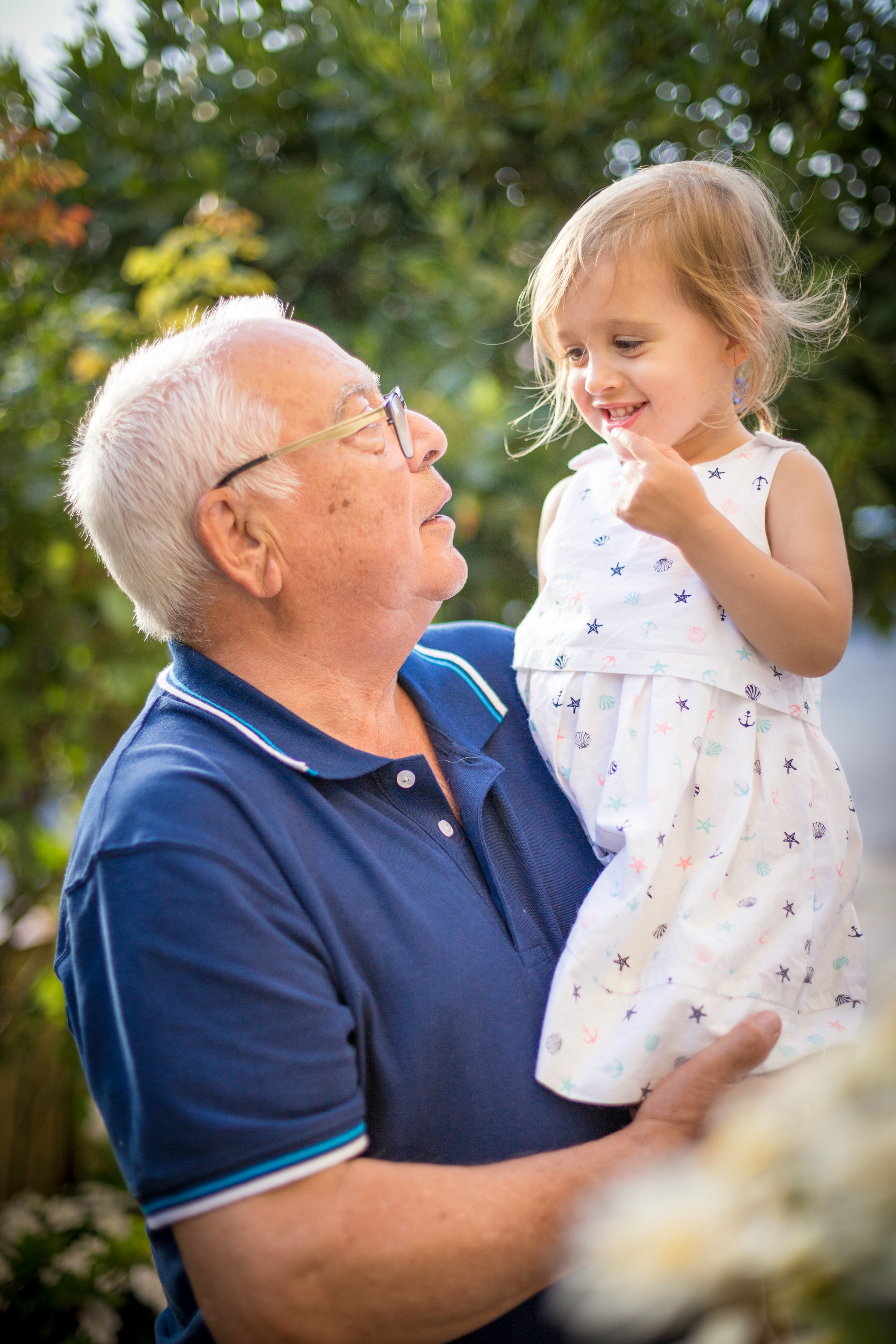 Grandpa with grandchild - staying healthy with medication reminders